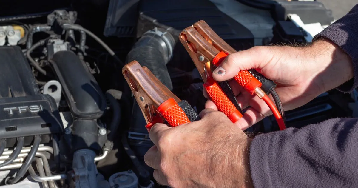 Jumper cables on a car battery - borrow $300 online in Canada