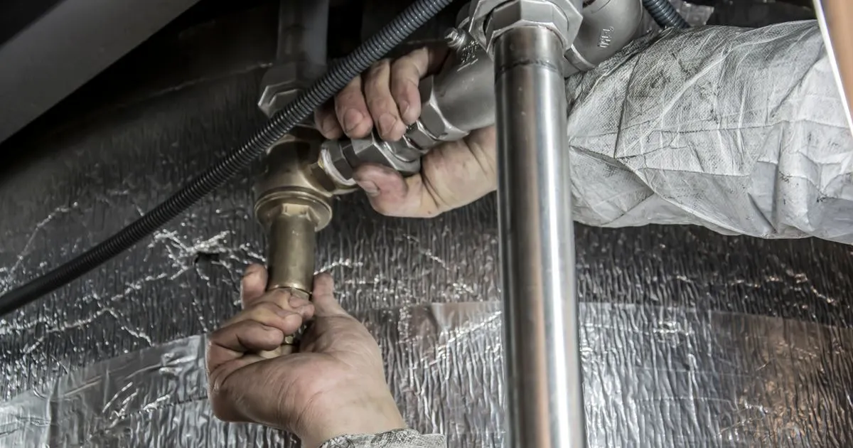 Plumbing repair in progress - borrow $500 online in Canada