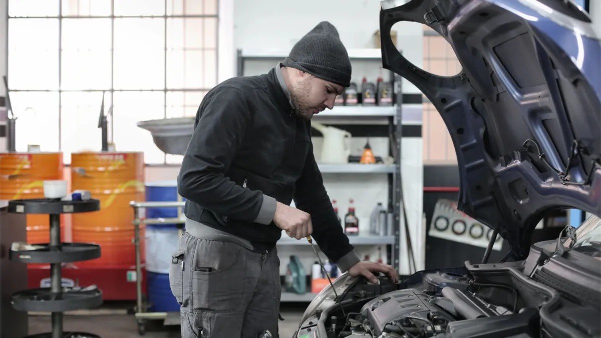 Auto shop repair work after borrowing money for car repairs online in Canada