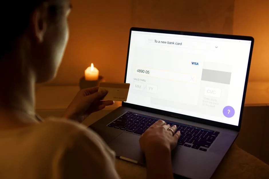 Applying online to borrow money for rent in Canada on a laptop