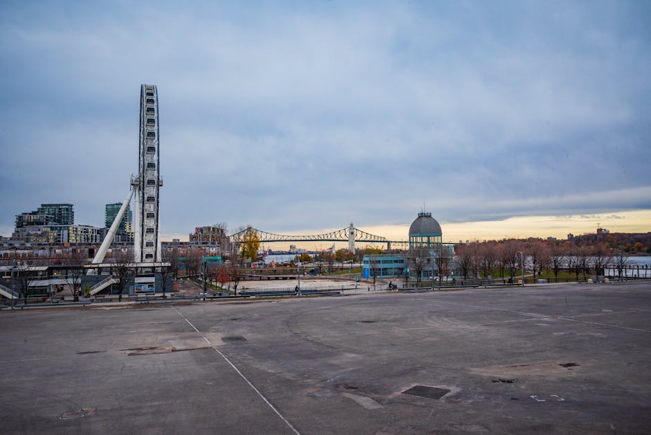 Scenic view of Montreal Old Port with Ferris wheel and city skyline in Quebec, Canada
