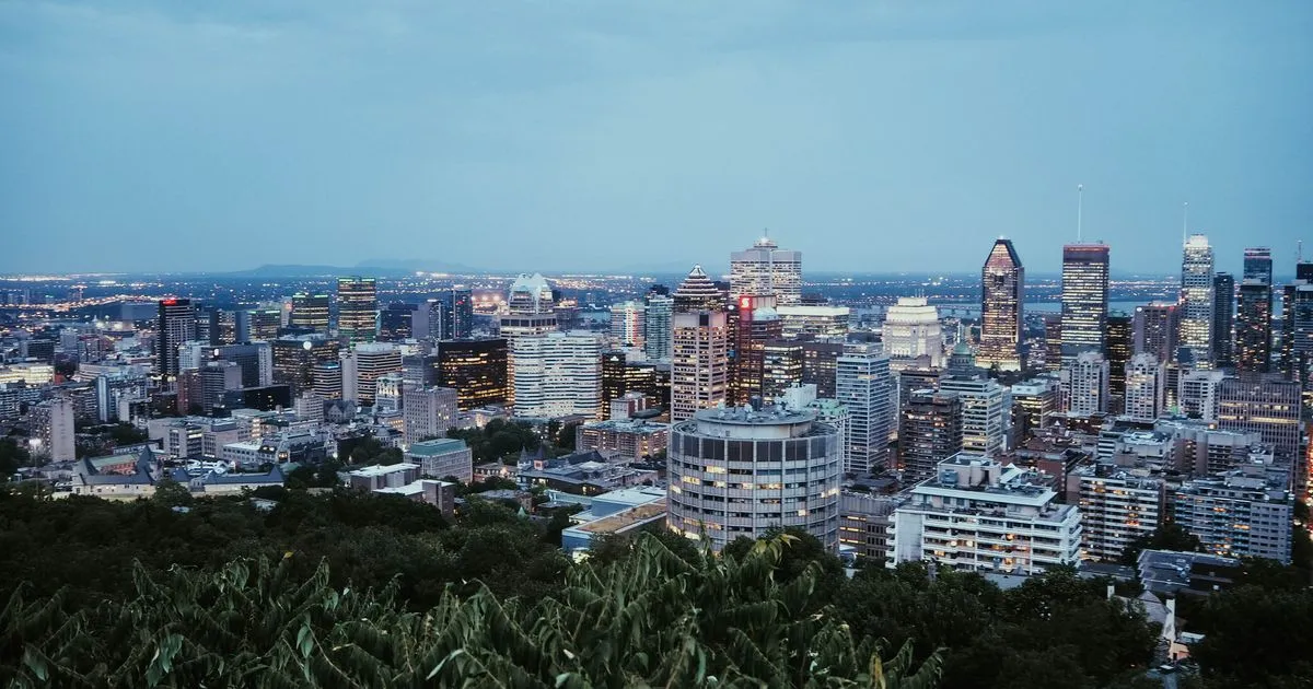 Montreal skyline at twilight from Mount Royal - borrow money online Quebec