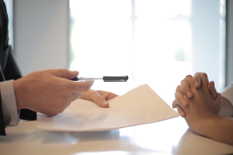 Person reviewing a loan offer before signing to borrow money online in Canada