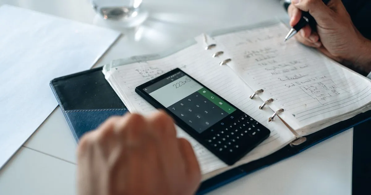Borrower budgeting the cost of a small online loan in Canada