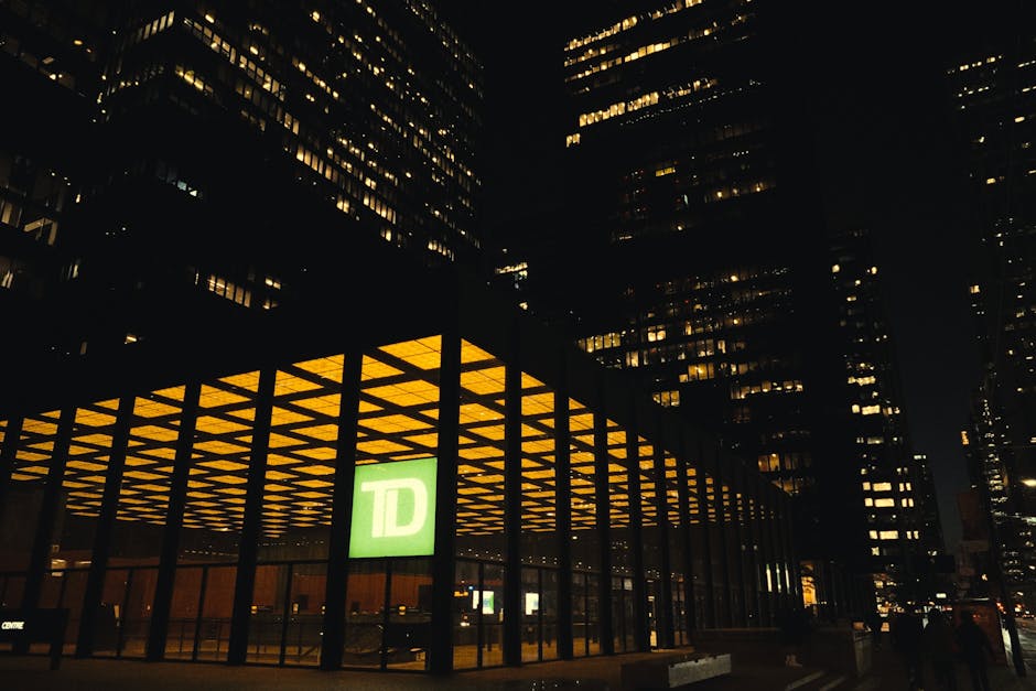 Toronto TD Centre at night representing the Canadian banking network behind fast online loan e-Transfers