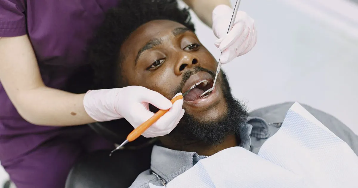 Canadian at a dental checkup before they borrow money for dental work
