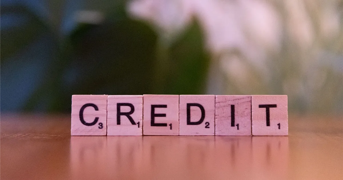 Letter tiles spelling credit: your file shapes the cost of borrowing