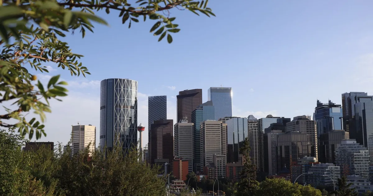 Downtown Calgary skyline on a summer evening, home to a large share of the online loans Alberta borrowers apply for